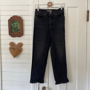 Levi’s Ribcage Jeans size 27 in black faded denim. Ultra high rise.